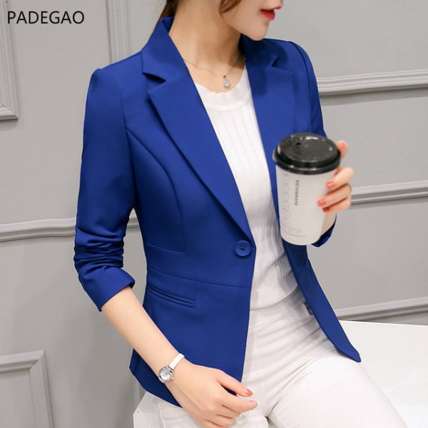 Royal blue blazer with white fitted sweater and matching pants