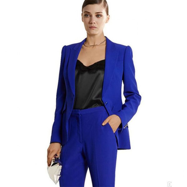 Royal blue suit with a black silk blouse with a low neckline