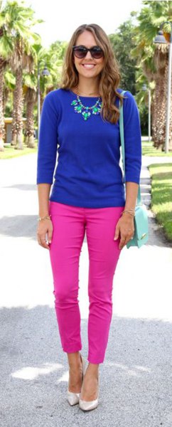 Royal blue sweater with three quarter sleeves and pink ankle jeans