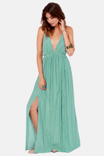 Sea green maxi dress with deep V-neckline and pleated side slit