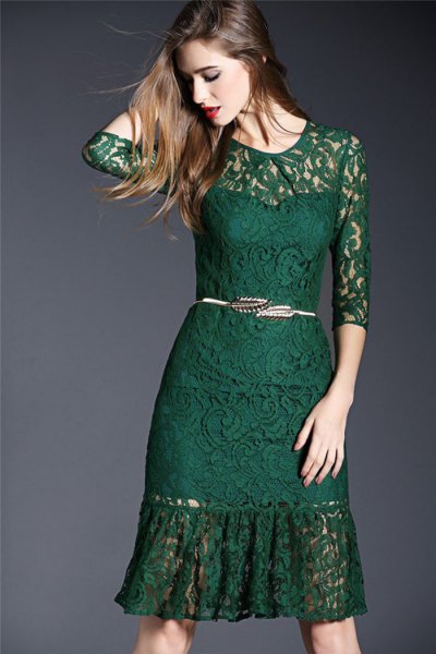 Semi-transparent, knee-length lace dress with half sleeves and belt
