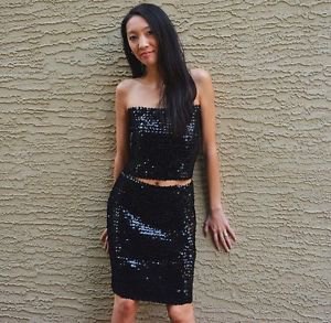 Short black tube top with sequins and matching knee length skirt