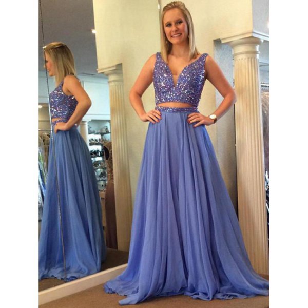 Two-piece floor-length blue dress with a deep V-neckline and sequins