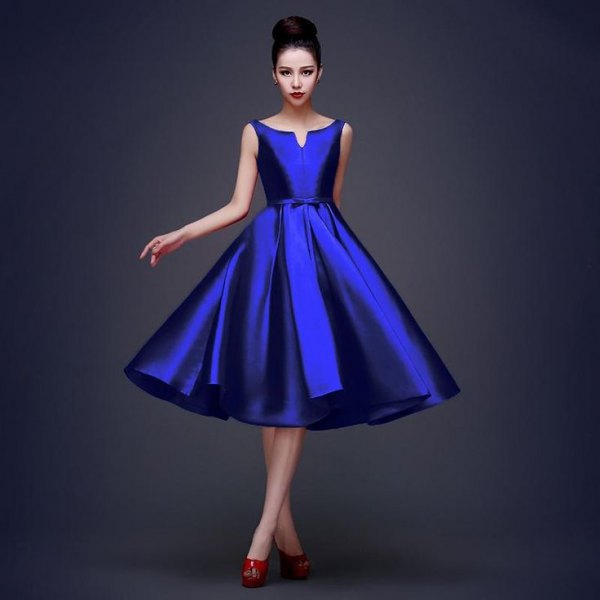 Sleeveless fitted flared silk midi cocktail dress in royal
blue
