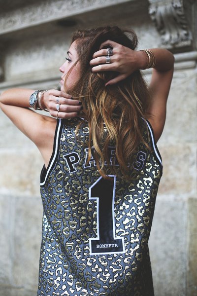 Silver and pink basketball jersey tank top with blue jean shorts