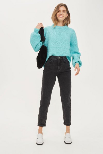Sky blue knit turtleneck sweater and black mom jeans