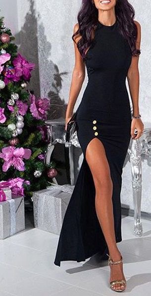 Sleeveless bodycon maxi dress with slit and open toe silver
heels