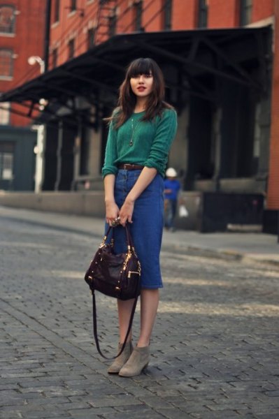 Sweater with blue high-waisted denim midi skirt and gray ankle boots