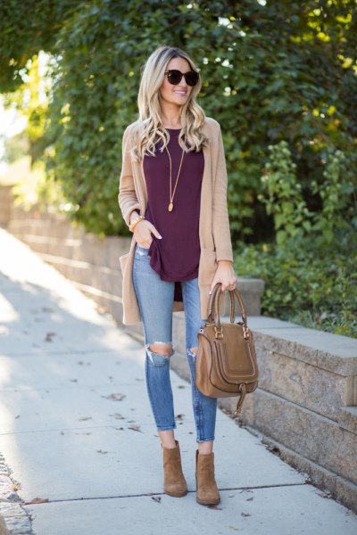 Tan cardigan worn with a gray tank top and ripped skinny jeans