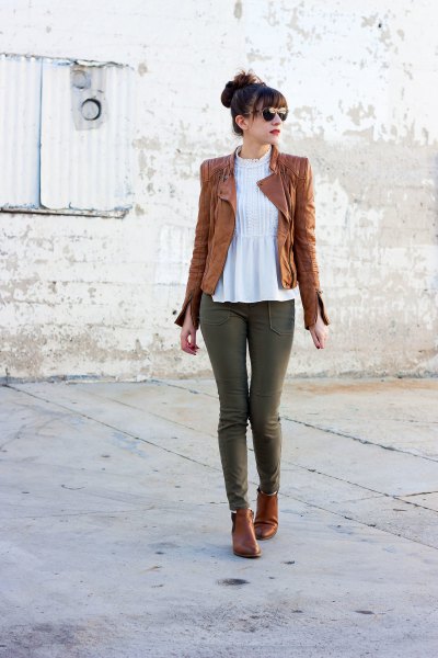 Leather tank jacket with white peplum top and gray jeans
