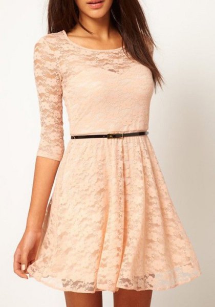 Semi-transparent lace dress with three-quarter sleeves and
belt