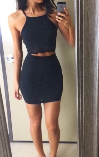 Two piece black mini dress with ankle straps and open toe
heels