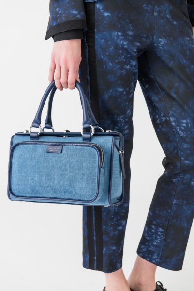 faded blue long-sleeved coat with matching pants and denim handbag