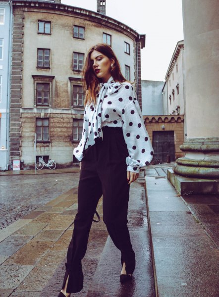 White and black polka dot chunky tie front blouse and high rise trousers