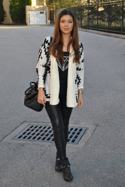 White and black printed blazer with leather leggings