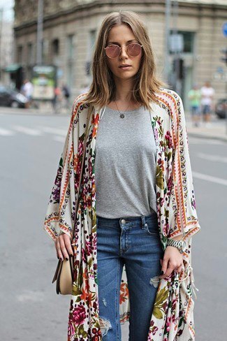 White and pink floral maxi cardigan and blue ripped jeans