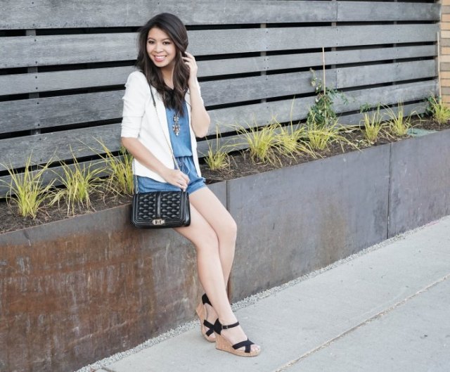 White blazer with blue mini shorts and black lace-up wedge sandals