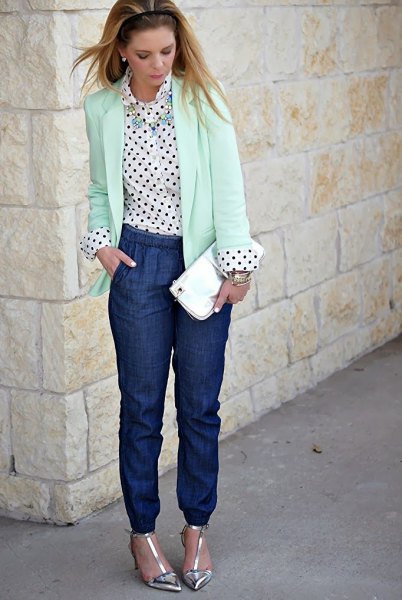 White blazer with a polka dot shirt and blue jeans