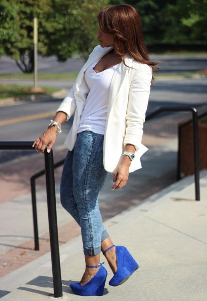 White blazer with V-neck tank top and gray jeans