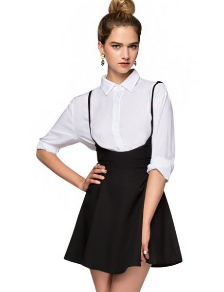 White button down shirt and black mini high rise skirt
