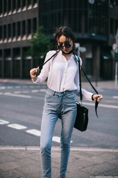 White button down shirt, black tight scarf and light blue jeans