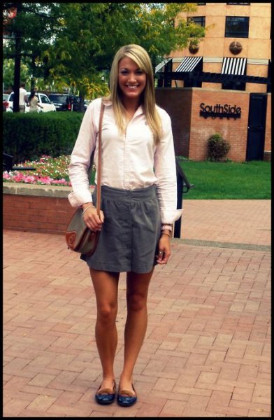 White button down shirt and gray mini casual skirt with elastic waistband