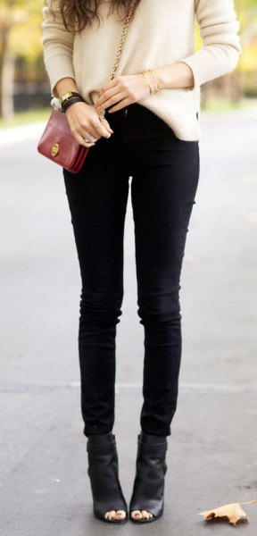 White thick sweater with black skinny jeans and peep toe ankle boots