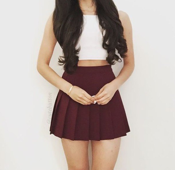 White crop top with pleated maroon mini skirt
