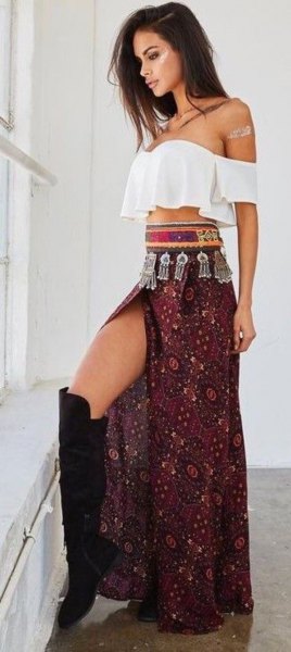 White, off-the-shoulder blouse with a black, high-slit gypsy skirt