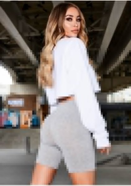 White cropped sweatshirt with gray cotton cycling shorts