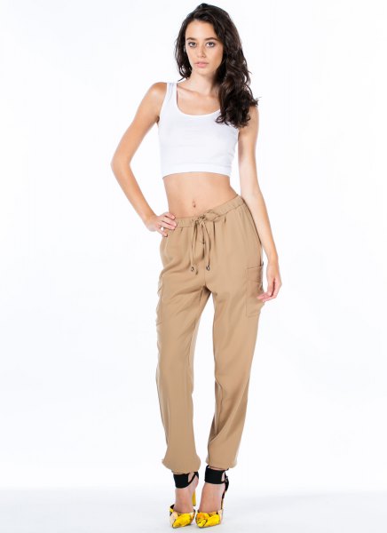 White cropped tank top with beige khaki jogging pants