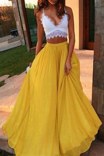 White lace crop top with deep V-neckline and yellow long flowy chiffon skirt