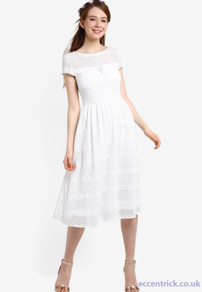 White short sleeve flared party dress with silver open toe heels