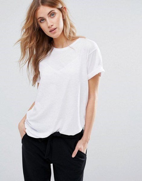 White fitted t-shirt with black boyfriend jeans