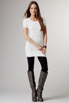 White bodycon sweater dress with short sleeves and leggings