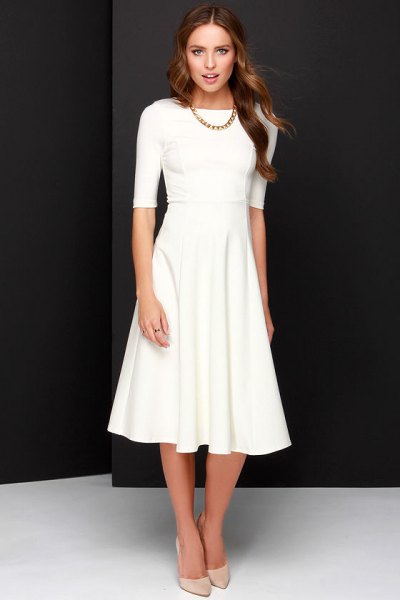 White half length flared midi dress with light pink heels