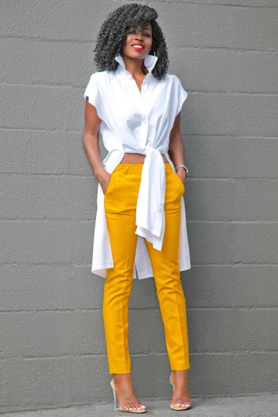 white high-low blouse with mustard yellow pants
