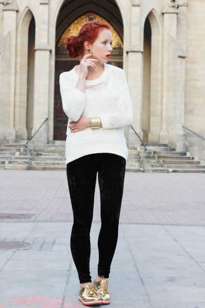 White knit sweater and black super skinny jeans