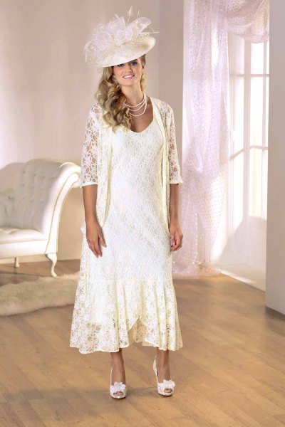 White lace cardigan with a flowing maxi lace hem