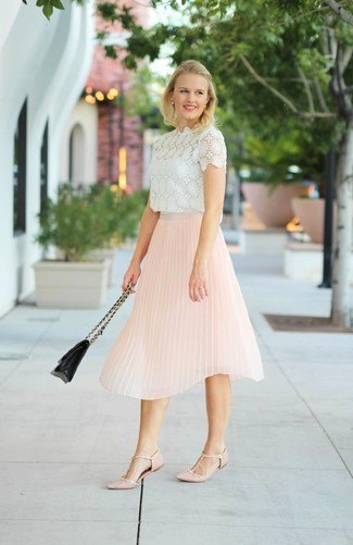 White lace short sleeve blouse with light yellow pleated midi skirt