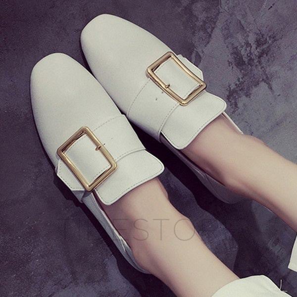 White loafers with wide linen trousers