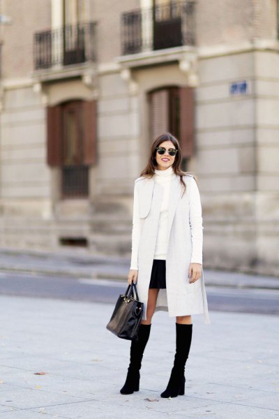 White long cardigan with high neck sweater and mini skirt