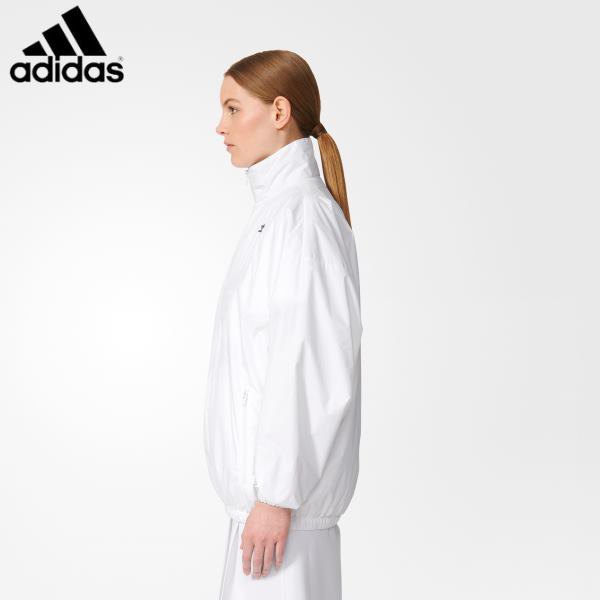 White windbreaker jacket with stand-up collar and running pants