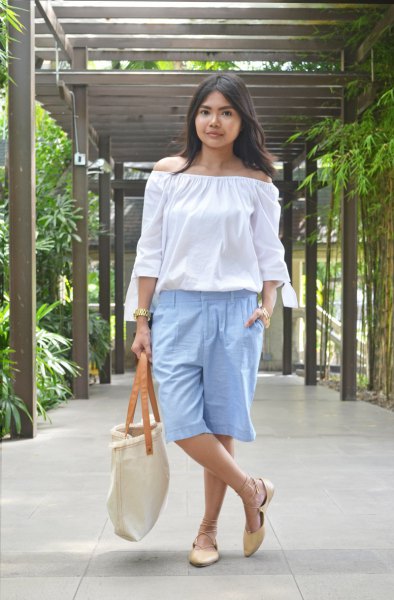 White off shoulder blouse with light blue knee length long cotton shorts