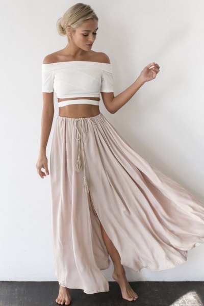 White off shoulder crop top with light gray long flowy skirt