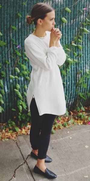 White crew neck ribbed tunic sweater with black leather loafers