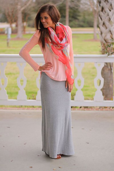 White long sleeve scoop neck top with gray cotton floor length skirt