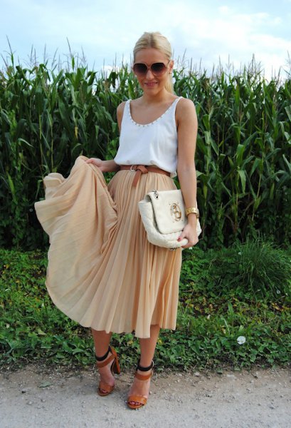 White scoop neck tank top and blush pleated midi skirt