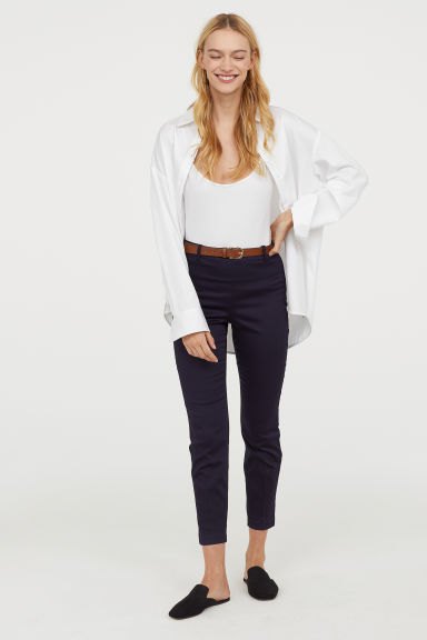 White scoop neck tank top, oversized shirt and cropped chinos