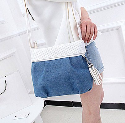 White sweater with blue mini denim shorts and shoulder bag